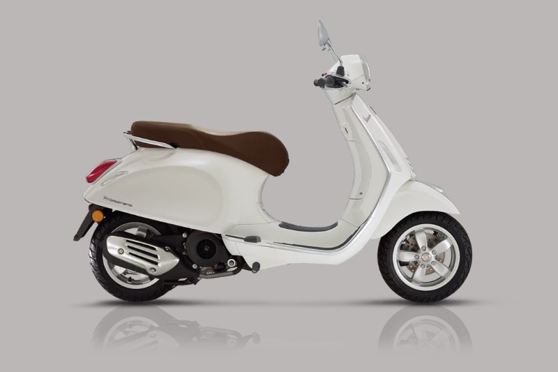 The Vespa is becoming a sort of a cult-scooter among the younger urban populace. It’s brand value fueled by its distinct styling and premium pricing has worked wonders. However, while that might be the case, the Vespa also suffers from moderate handling, thanks to heavy front end. What we love is the way the Piaggio have moved the Vespa effortlessly through time.