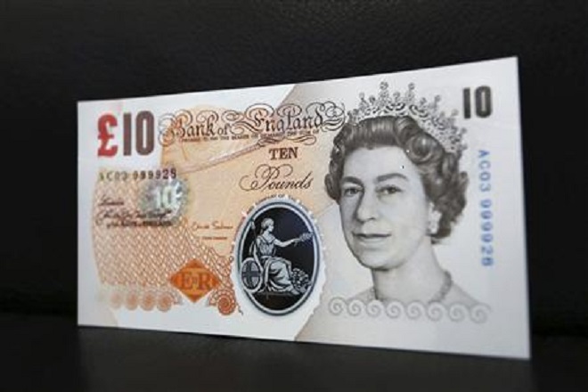 A sample polymer ten GB pound banknote is seen on display at the Bank of England in London September 10, 2013. REUTERS/Chris Ratcliffe/pool A sample polymer ten GB pound banknote is seen on display at the Bank of England in London September 10, 2013. REUTERS/Chris Ratcliffe/pool