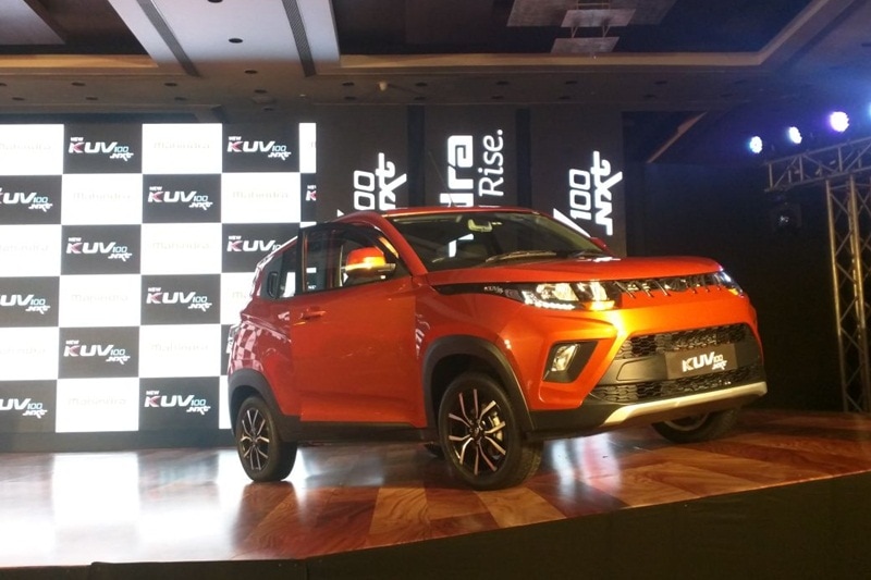 The major changes on the Mahindra KUV100 NXT are at the exterior. The car now gets a muscular and aggressive stance that has been accentuated by an aggressive front grille, revised front and rear bumpers with silver skid plates, flared wheel arches with wheel cladding and 15-inch diamond cut dual tone alloy wheels. Other than these, newly designed tailgate, new fog lamps with black bezel surrounds, sunglass inspired headlamps with LED DRLs, integrated roof rails, door & sill cladding and sporty rear spoiler are also part of the update.