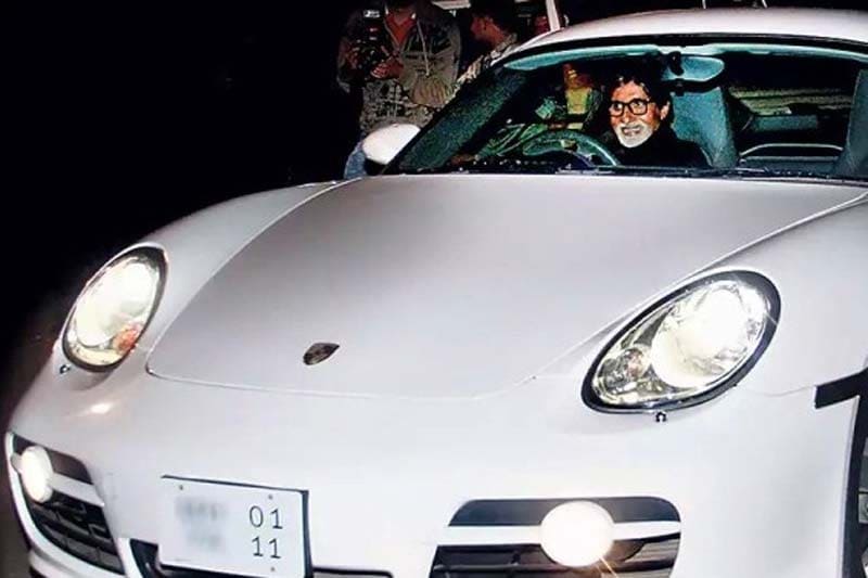 Porsche Cayman S: Tall sir Bachchan owns this tiny little brat Porsche Cayman S. He has been spotted on his pure white Cayman a number of times and the sportscar is powered by a 3.4L petrol engine and costs about Rs 2 crore. Image Source: successstory.com