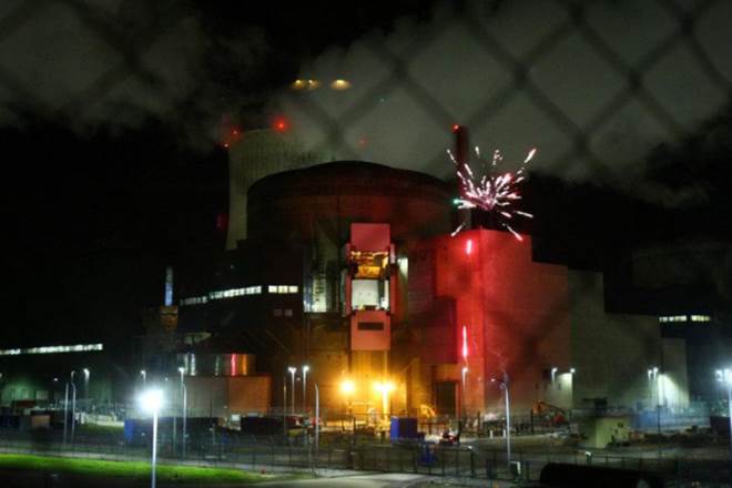 nuclear power site, Greenpeace activists,  Cattenom site, EDF nuclear reactors, atomic power, firecrackers, france,Cattenom nuclear power site
