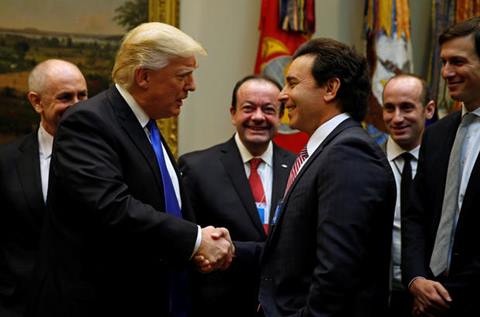 U.S. President Donald Trump greets Ford Motor Company CEO Mark Fields as he hosts a meeting with U.S. auto industry CEOs at the White House in Washington January 24, 2017. REUTERS/Kevin Lamarque - RTSX4OL
