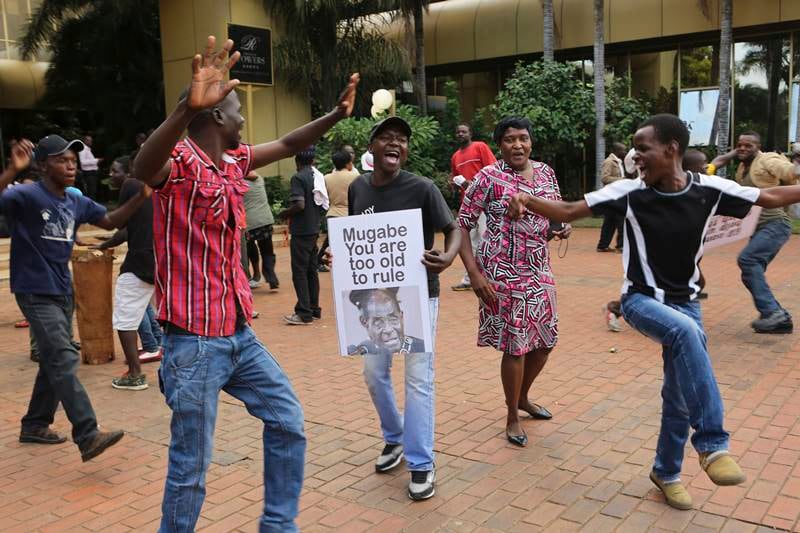 robert mugabe, robert mugabe resigns, Zimbabwe, Zimbabwe celebrates, south africa, mugabe, mugabe life, mugabe wife, mugabe rule, mugabe rule ends, zimbabwe latest news