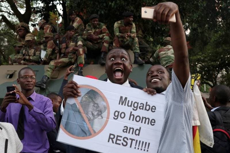 robert mugabe, robert mugabe resigns, Zimbabwe, Zimbabwe celebrates, south africa, mugabe, mugabe life, mugabe wife, mugabe rule, mugabe rule ends, zimbabwe latest news