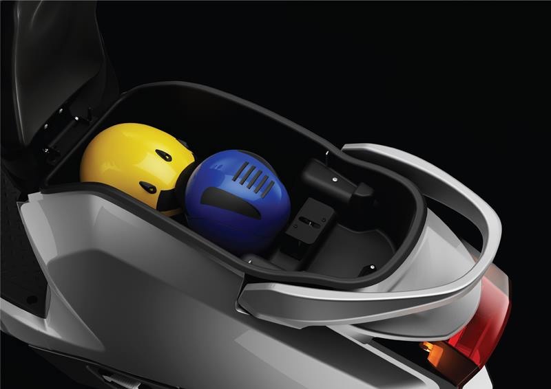 Flow e-scooter gets enough space to store two medium sized helmets. It also gets an in-built mobile charger.