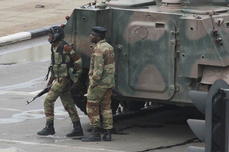 Zimbabwe, Zimbabwe military, Zimbabwe military coup, Zimbabwe crisis, Zimbabwe army, President Robert Mugabe, President mugabe, Zimbabwe under military, Major General Sibusiso Moyo, house arrest, Robert Mugabe house arrest, independence, Britain, world news