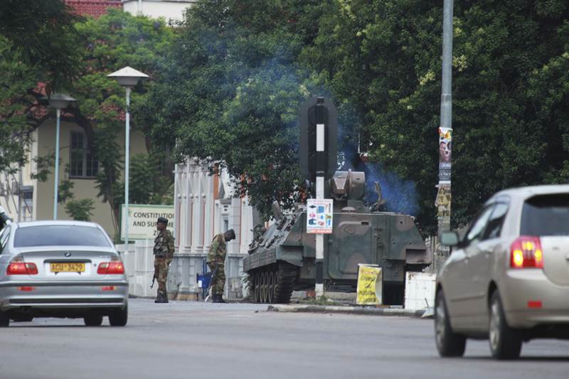 Zimbabwe, Zimbabwe military, Zimbabwe military coup, Zimbabwe crisis, Zimbabwe army, President Robert Mugabe, President mugabe, Zimbabwe under military, Major General Sibusiso Moyo, house arrest, Robert Mugabe house arrest, independence, Britain, world news