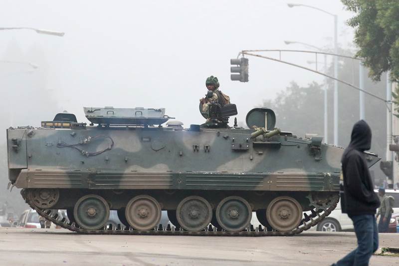 Zimbabwe, Zimbabwe military, Zimbabwe military coup, Zimbabwe crisis, Zimbabwe army, President Robert Mugabe, President mugabe, Zimbabwe under military, Major General Sibusiso Moyo, house arrest, Robert Mugabe house arrest, independence, Britain, world news