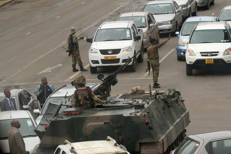 Zimbabwe, Zimbabwe military, Zimbabwe military coup, Zimbabwe crisis, Zimbabwe army, President Robert Mugabe, President mugabe, Zimbabwe under military, Major General Sibusiso Moyo, house arrest, Robert Mugabe house arrest, independence, Britain, world news