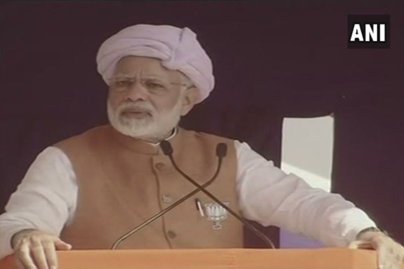"There was a person who led a life of discipline on Mahatma Gandhi's ideals, a disciplined & hardworking son of the soil just like Sardar Patel but he had the same 'flaw' of being a Gujarati, so he was not allowed to stay in national politics by them (Congress)," PM Modi said while talking about former Gujarat chief minister Keshubhai Patel. (ANI)