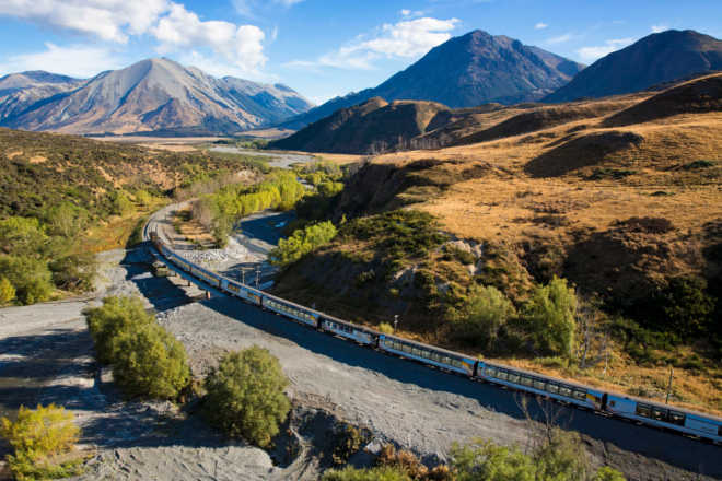 Starting in Christchurch, the train travels across the Canterbury Plains alongside braided rivers