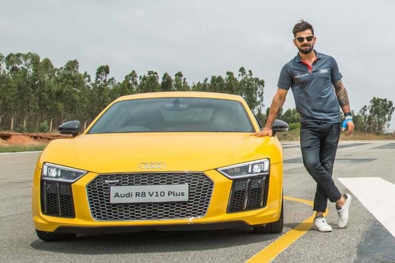 Audi R8 V10: The R8 V10 is powered by a 5.2-litre V10 engine that delivers 517 hp for 530 Nm, paired to a 7-speed twin clutch DSG automatic transmission gearbox along with Quattro. The car bears a heavy price tag of Rs 2 crore.