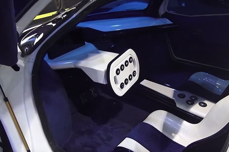 The insides are still under development, however, the prototype features a minimalist and futuristic interior, and seems surprisingly spacious. Whether or not the end product will deliver on the claimed power figures, we'll know in time, but the development has definitely made progress. (Image: Carbuzz)