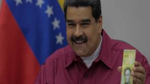 Venezuela, cash, Nicolas Maduro, Manuel Santos