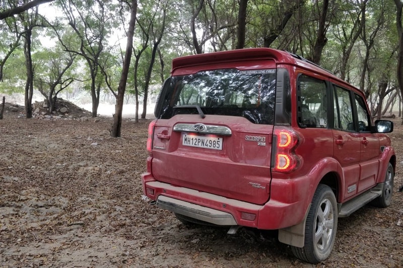 The rear of Mahindra Scorpio gets minor updates. The tailgates are newly designed finished in chrome and gets new red lens LED tail lamps.