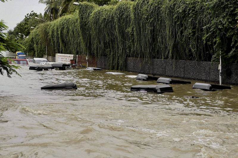 chennai rains photo gallery, chennai rains, news, latest news, India news