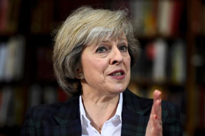 theresa may, british prime minister, russia, may pledges to protect europe from russia, NATO theresa may, british prime minister, russia, may pledges to protect europe from russia, NATO