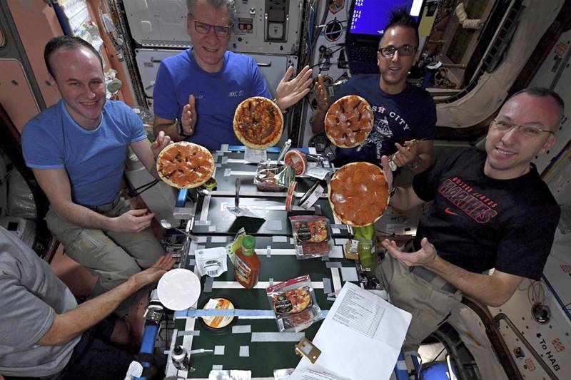 Astronauts, International Space Station, pizza party, pizza in space, space station, eat pizza, pizza lovers, pizza in space station, astronauts eat pizza, NASA, Randy Bresnik, world news, NASA photos