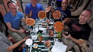 Astronauts, International Space Station, pizza party, pizza in space, space station, eat pizza, pizza lovers, pizza in space station, astronauts eat pizza, NASA, Randy Bresnik, world news, NASA photos