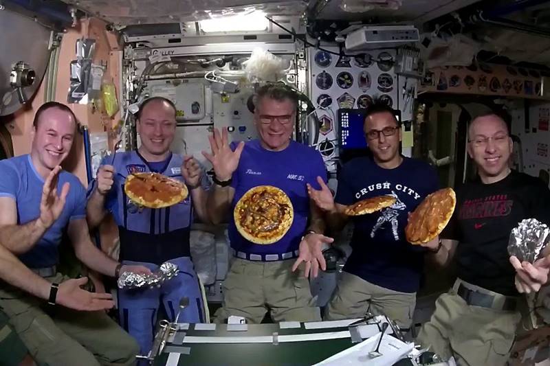 Astronauts, International Space Station, pizza party, pizza in space, space station, eat pizza, pizza lovers, pizza in space station, astronauts eat pizza, NASA, Randy Bresnik, world news, NASA photos