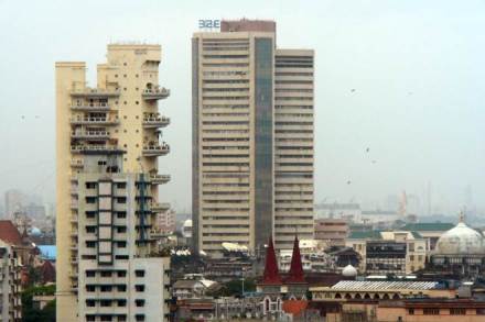 Sensex hits record high of 34,087, Nifty stays in red; RCom shares spike 25% within minutes