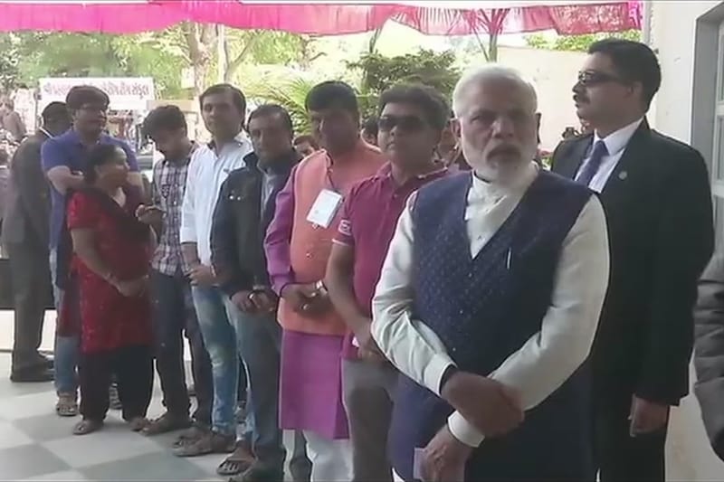 PM Modi stood in queue at booth number 115 in Sabarmati's Ranip locality to cast his vote. BJP's sitting MLA Arvind Patel is up against Congress' Jitubhai Patel from Sabarmati seat. (Source: ANI)