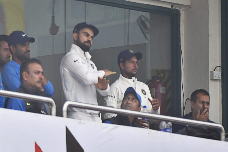 India vs Sri Lanka Highlights, virat kohli double century, sri lankan players halt play, sri lankan players wear masks, india vs sri lanka test disrupted, smog hit india vs sri lanka test
