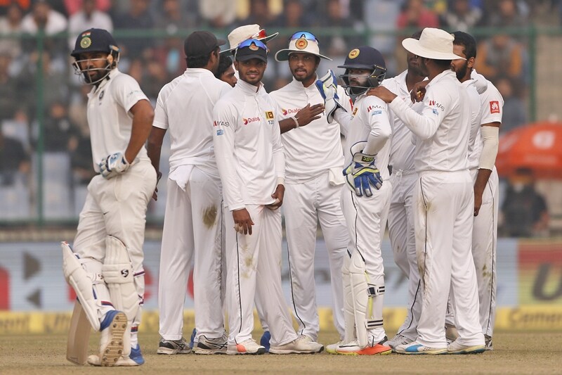 India vs Sri Lanka Highlights, virat kohli double century, sri lankan players halt play, sri lankan players wear masks, india vs sri lanka test disrupted, smog hit india vs sri lanka test