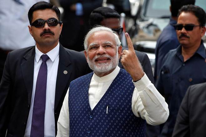 Sensex turns green, gains 240 points as Gujarat results trends swing back into Modi’s favour Sensex turns green, gains 240 points as Gujarat results trends swing back into Modi’s favour
