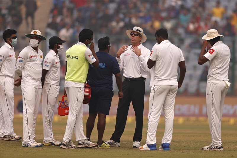 India vs Sri Lanka Highlights, virat kohli double century, sri lankan players halt play, sri lankan players wear masks, india vs sri lanka test disrupted, smog hit india vs sri lanka test