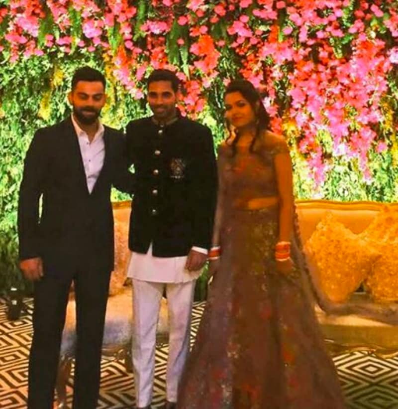Virat Kohli with the newlywed couple- Bhuvneshwar Kumar and Nupur Nagar. (Instagram)