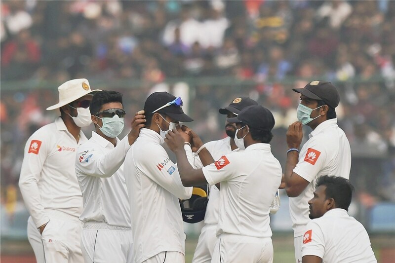 India vs Sri Lanka Highlights, virat kohli double century, sri lankan players halt play, sri lankan players wear masks, india vs sri lanka test disrupted, smog hit india vs sri lanka test