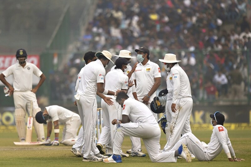 India vs Sri Lanka Highlights, virat kohli double century, sri lankan players halt play, sri lankan players wear masks, india vs sri lanka test disrupted, smog hit india vs sri lanka test