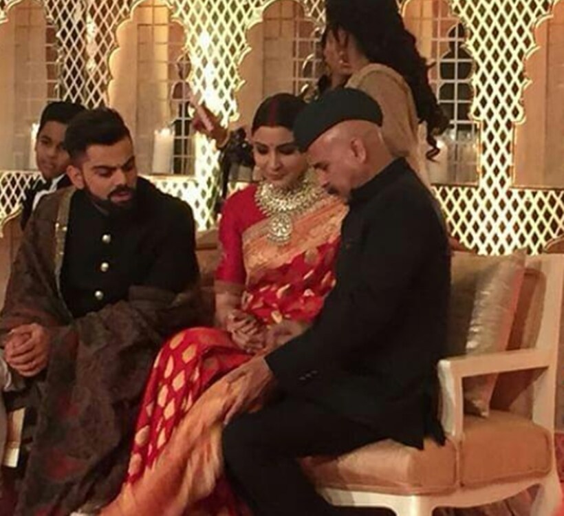 Anushka's father having a chat with the newly wed couple (Source: IE)