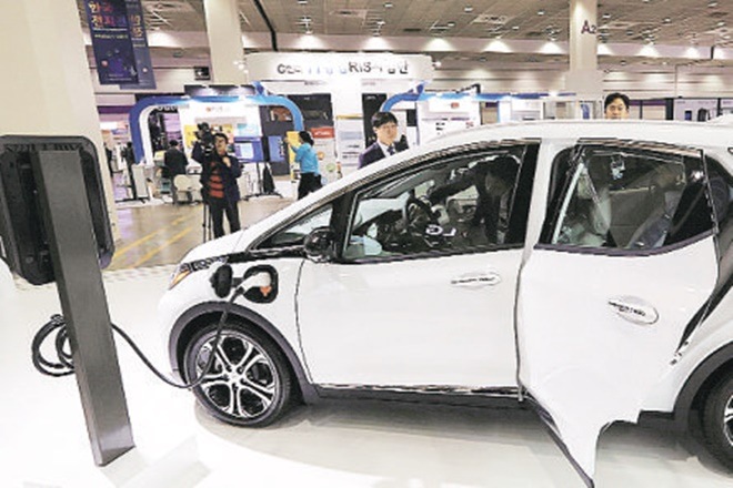 Electric vehicles charging infrastructure, EESL, Tata Motors,  Mahindra and Mahindra, EVI Technologies, Exicom Power Solutions, AC chargers,  Exicom