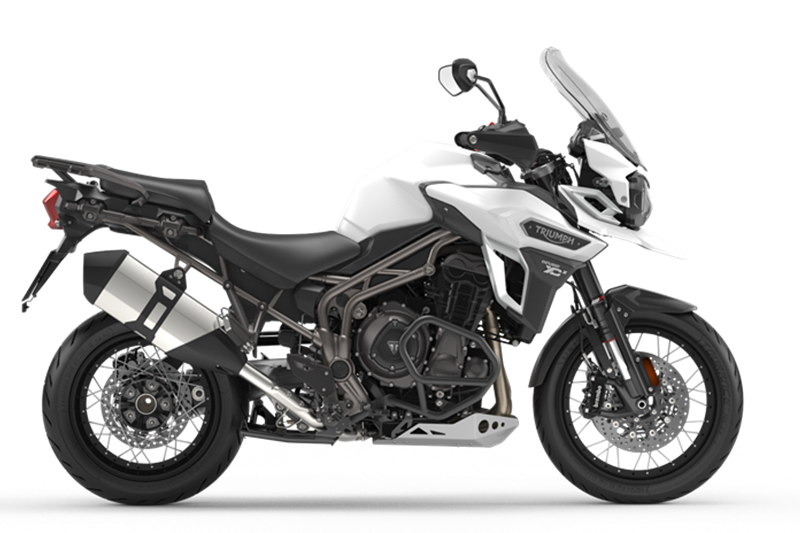 ADV: Triumph Tiger Explorer 1200 XCx is the largest adventure tourer motorcycle in the British brand's lineup. It was launched in India at a price of Rs 18.75 lakh (ex-showroom, Delhi). It is powered by a 1,215 cc inline three engine which makes 137 hp and 123 Nm of torque. Also included in terms of kit is a ride-by-wire throttle and an array of riding modes that include - Road, Rain and Off-Road, as well as a programmable Rider mode.