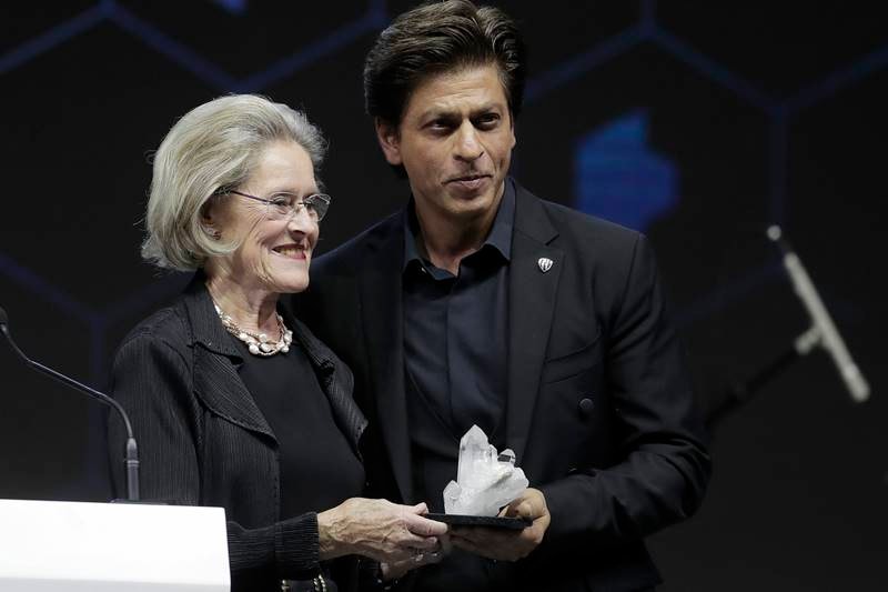 Bollywood superstar Shahrukh Khan is at the World Economic Forum (WEF) summit to receive the Crystal award along with Blanchett and legendary musician Elton John. Receiving the award, Khan applauded Blanchett -- who was honoured with the award just before him -- for being the queen of billions of hearts, including his own. He talked extensively about his social initiative, which he has named after his father, and the reason for the same. Let us take a look at some of the images from the summit: