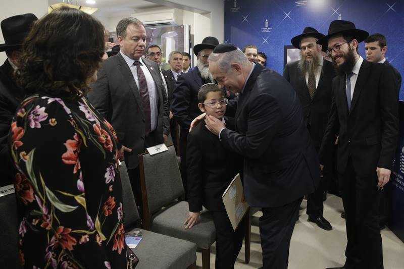 The Israeli prime minister thanked Moshe for hosting him and showing him his room in the Chabad House. (AP Photo)