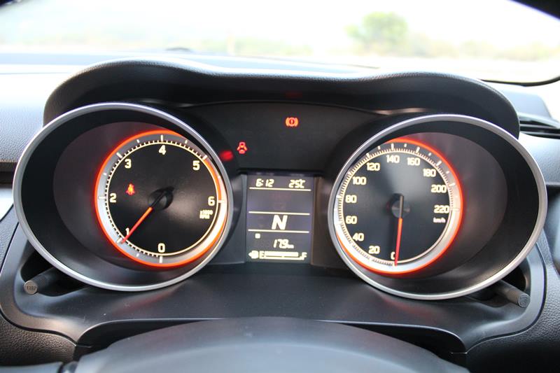 2018 Maruti Suzuki Swift safety features: On the safety front, the new Swift gets dual-airbags, ABS with EBD as a standard safety feature in all the variants. The manual cars with touchscreen infotainment get a wide angle reverse parking camera.