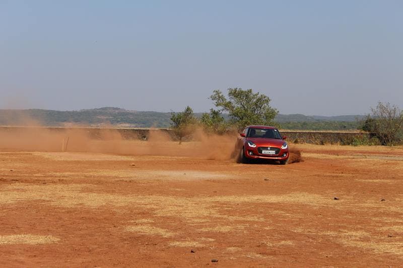 2018 Maruti Suzuki Swift retains the most important element of Swift and remains the most fun car to drive in the segment. Both 1.2L petrol and 1.3 diesel engine are nicely refined and tuned to give out a nice sporty feel while driving. We had the chance to drive the petrol manual and diesel AMT variants and both the cars impressed us with its performance.
