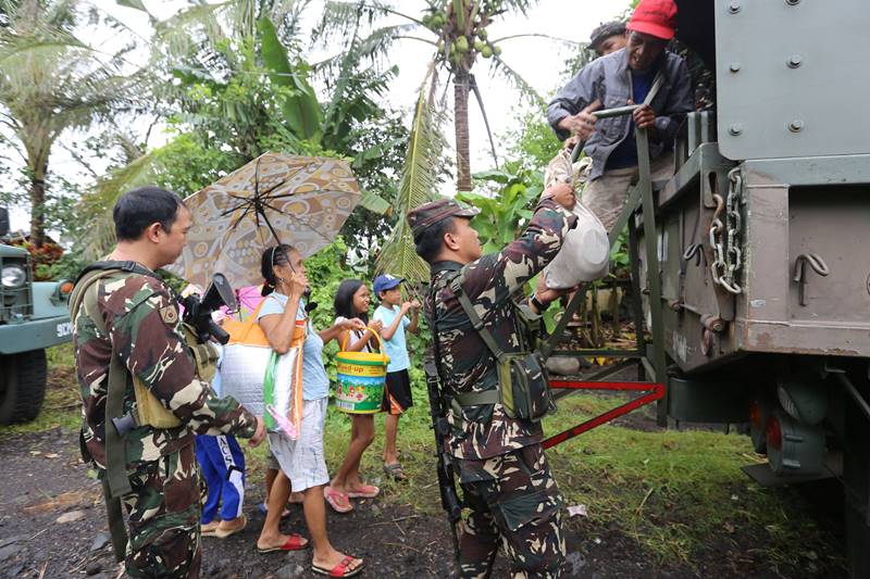 More than 30,000 ash masks and about 5,000 sacks of rice, along with medicine, water and other supplies, were being sent to evacuation centers, Office of Civil Defense regional director Claudio Yucot said. (Image: Reuters)