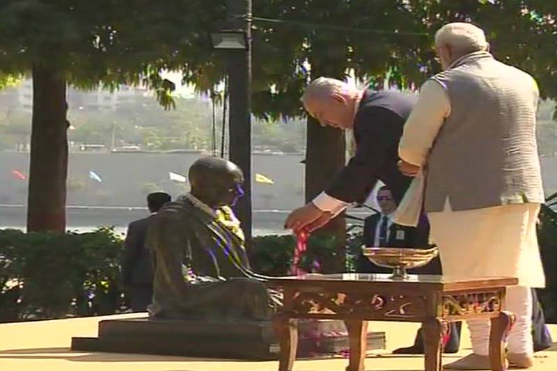 PM Modi and Israel PM Netanyahu and his wife Sara Netanyahu pay tribute to Mahatma Gandhi at Sabarmati Ashram. (ANI Photo)