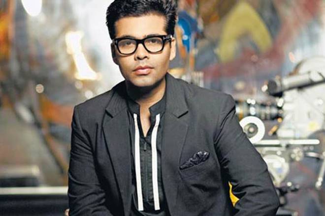 Karan Johar, Madame Tussauds, Karan Johar film, kalank, Karan Johar wax statue, An Unsuitable Boy" is also seen kept in front of him.