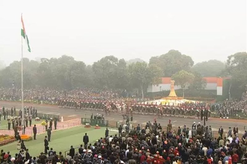 People standing up as the National Anthem is played at Rajpath. (Photo: IE)
