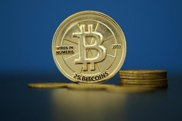 Bitcoin (virtual currency) coins are seen in an illustration picture taken at La Maison du Bitcoin in Paris, France, May 27, 2015. REUTERS/Benoit Tessier Bitcoin (virtual currency) coins are seen in an illustration picture taken at La Maison du Bitcoin in Paris, France, May 27, 2015. REUTERS/Benoit Tessier