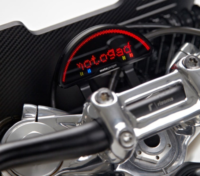 The team also added a Motogadget Motoscape Pro dash, which supports all the stock functionality. And they removed the keyed ignition in favor of an RFID system from Motogadget.