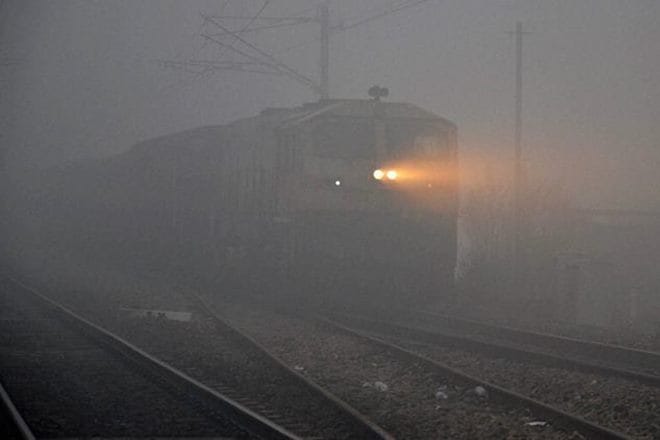 delhi temperature, delhi weather, temperature in delhi, railways schedule, railways status, train status, delhi trains, trains cancelled, trains delayed, delhi fog