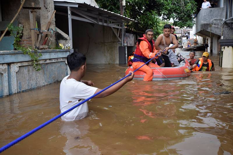 Authorities were forced to release water from a reservoir upstream in the city of Bogor as water levels prompted the highest alert. (Image: Reuters)
