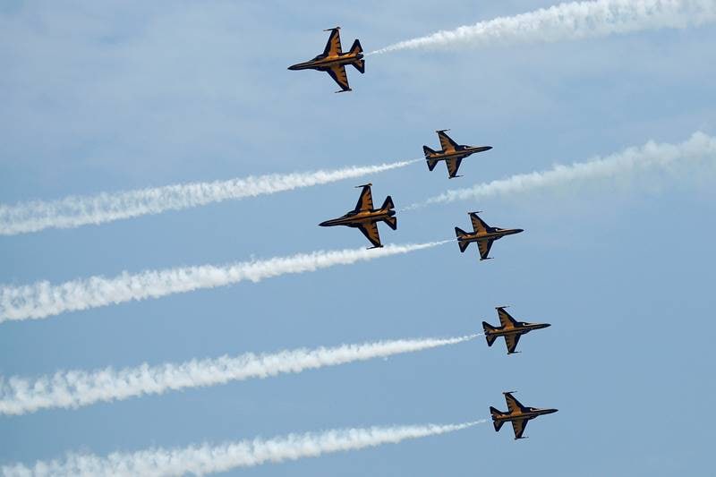 Republic of Korea Air Force Black Eagles Aerobatics Team T-50 aircrafts perform a manoeuvre during a preview of their aerial display at the Singapore Airshow. (Image: Reuters)