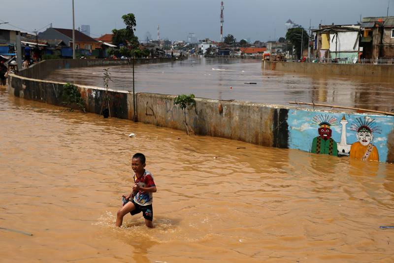 Police and military personnel have been working with volunteers to deal with the impact of the floods. (Image: Reuters)